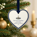 Personalized Our First Christmas as Mr. & Mrs. heart ornament hanging on a Christmas tree